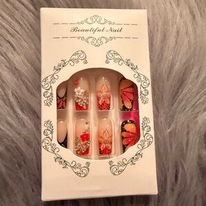 Decorative Nail Art Set with Red and Black Designs